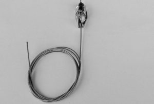 What to do with the excess wire on my picture hanging system?